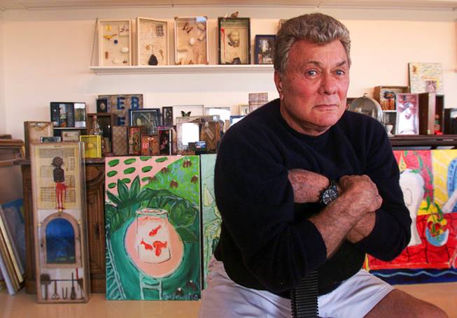 Tony Curtis sits for a photo in the art studio of his home Friday, Nov. 30, 2001. Curtis will have a retrospective exhibit of his work at UNLV beginning Dec. 10.